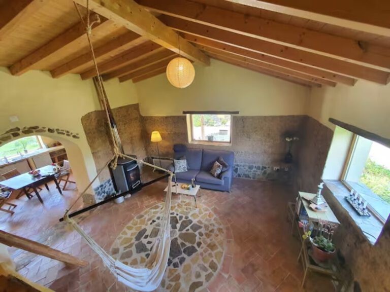 spacious living room with cozy fire place 768x576
